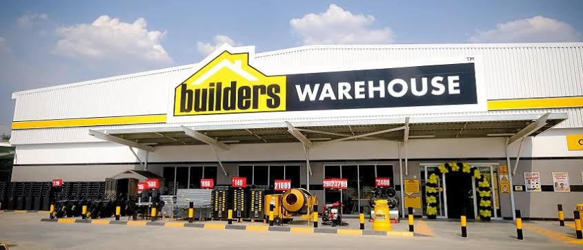 A modern Builders Warehouse storefront, providing retail and logistics employment in 2026.