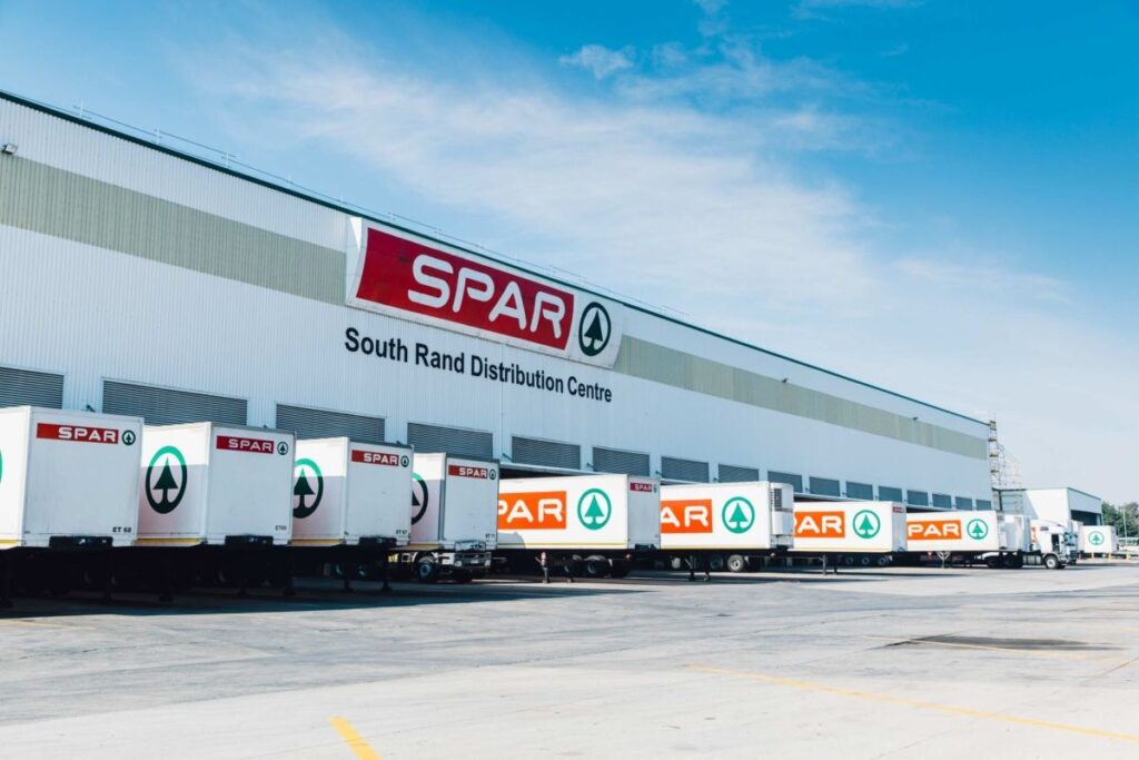 Spar Distribution Centre trucks ready for delivery, showing warehouse jobs in action.